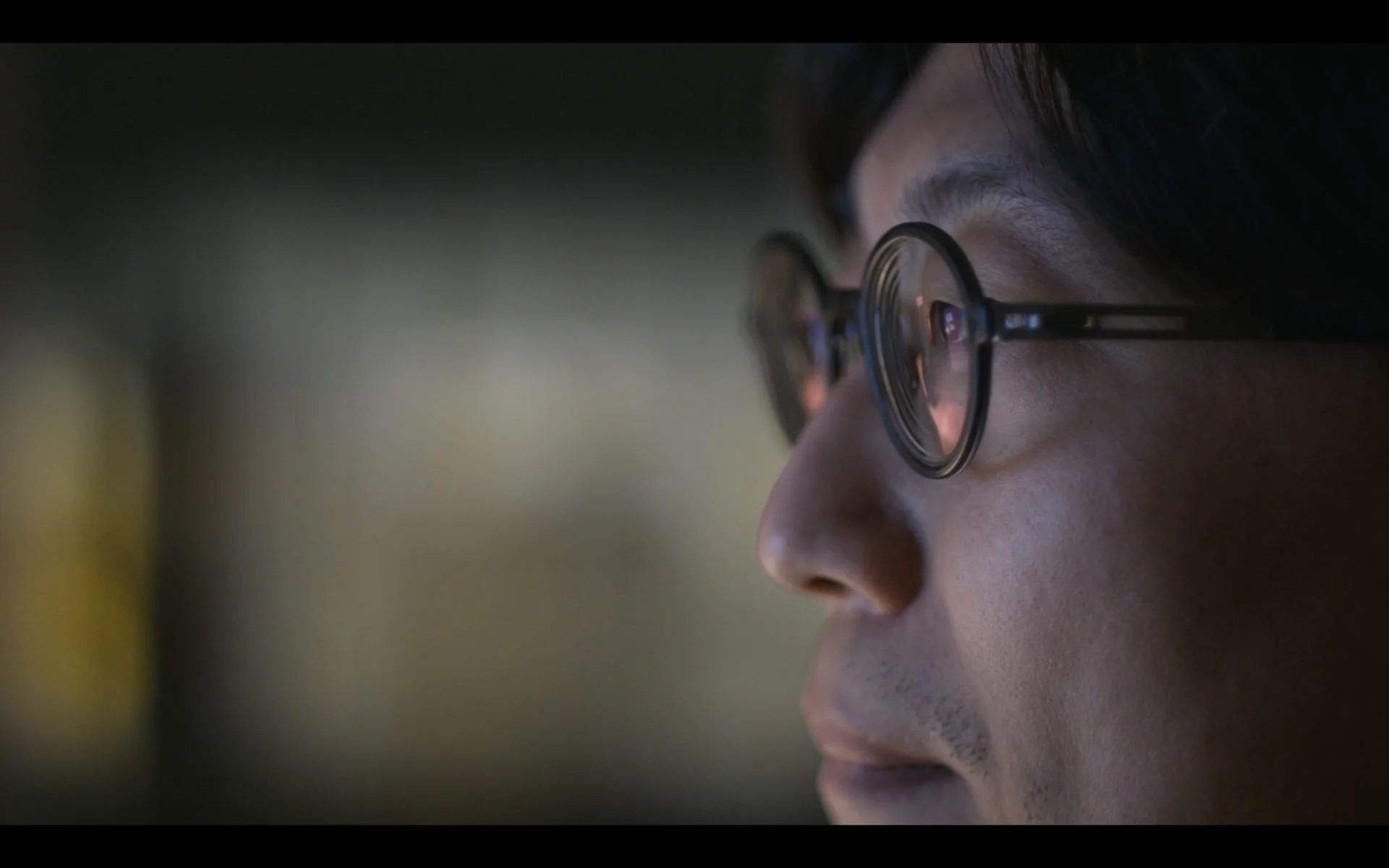 Portrait of an engineer reviewing digital design work, filmed as part of a branded architectural documentary exploring engineering and innovation.