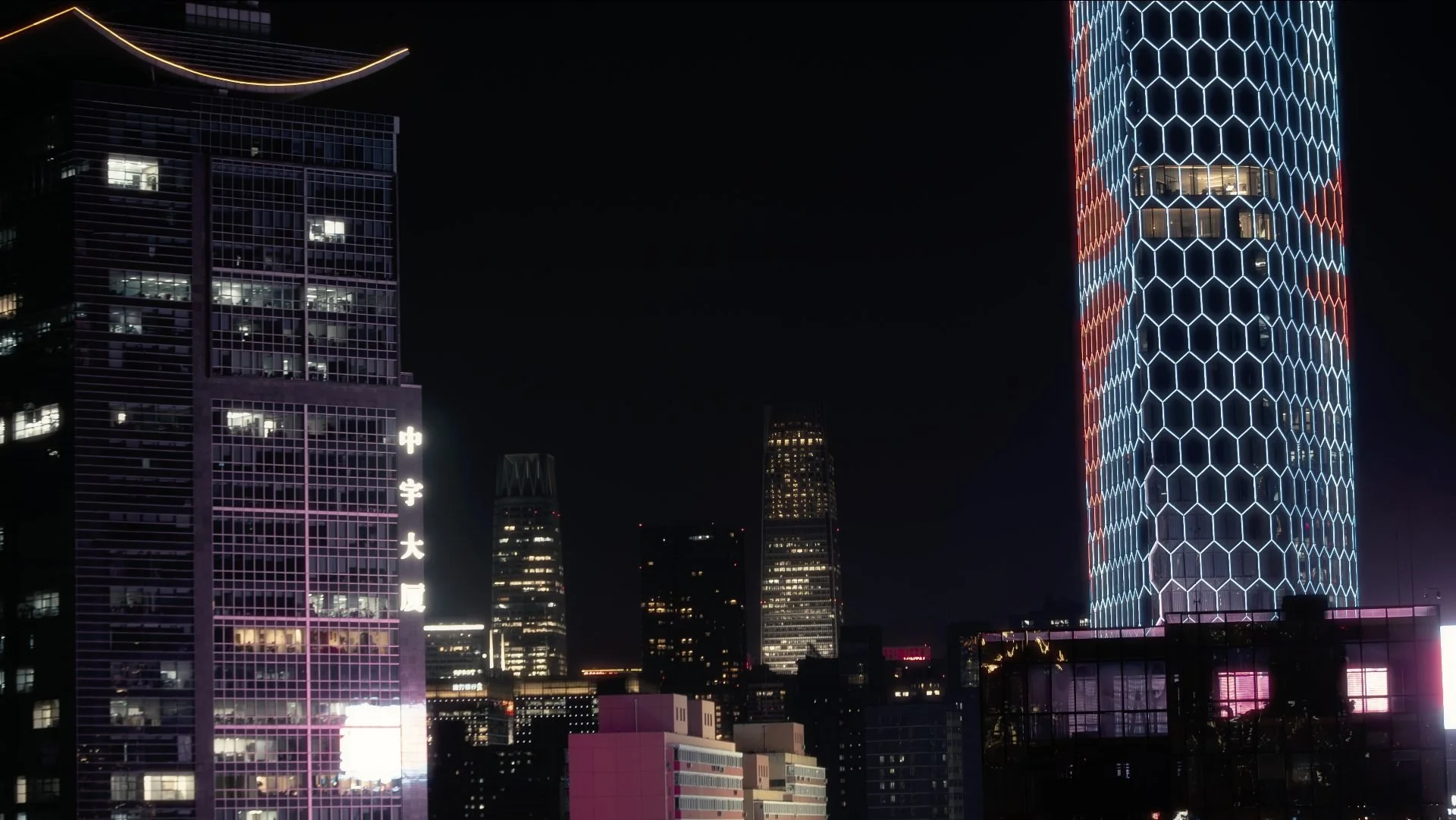 GE digital transformation corporate film — nighttime Chinese city skyline with
illuminated skyscrapers, GE film series