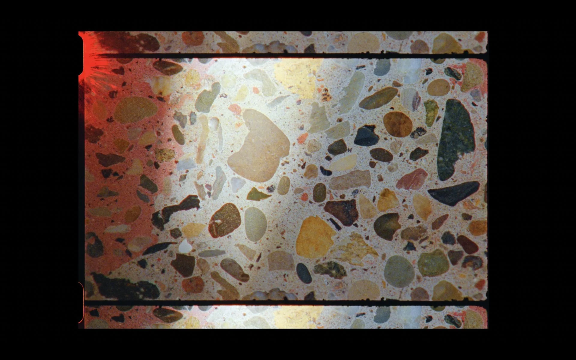 Terrazzo material detail filmed on 16mm, emphasising craft, surface, and materiality within a branded architectural documentary film.