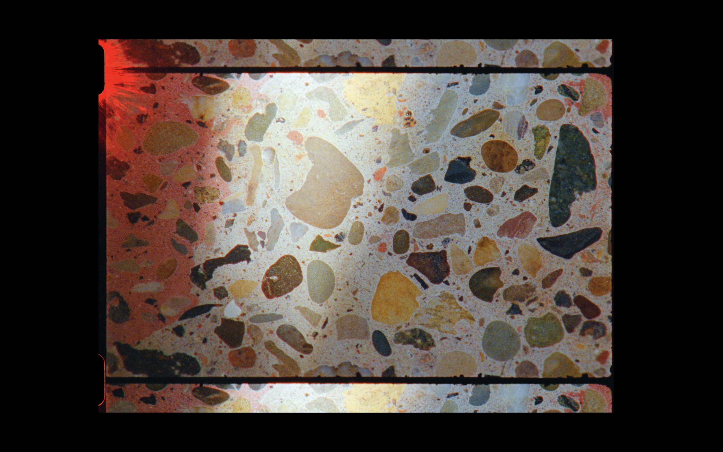 Terrazzo material detail filmed on 16mm, emphasising craft, surface, and materiality within a branded architectural documentary film.