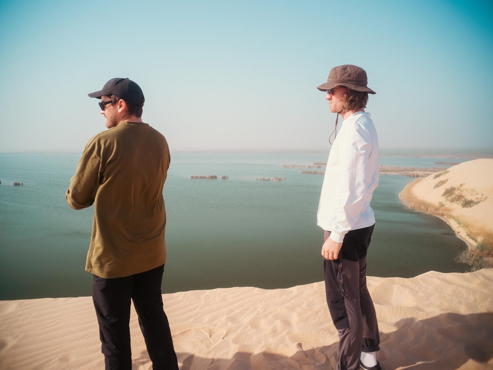 Director James Dougan & DOP Max Cutting overlooking inland sea and sand dunes during Evolving Cities production