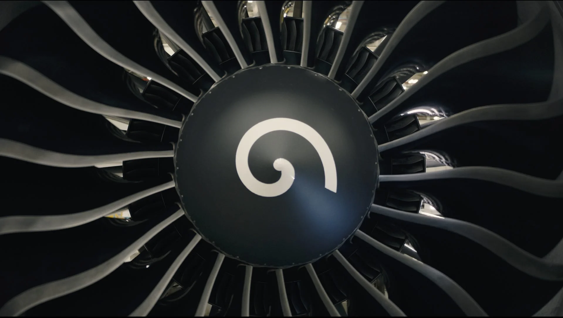 GE Aviation engine fan blades dramatic closeup with GE logo — corporate
film cinematography by James Dougan, creative director