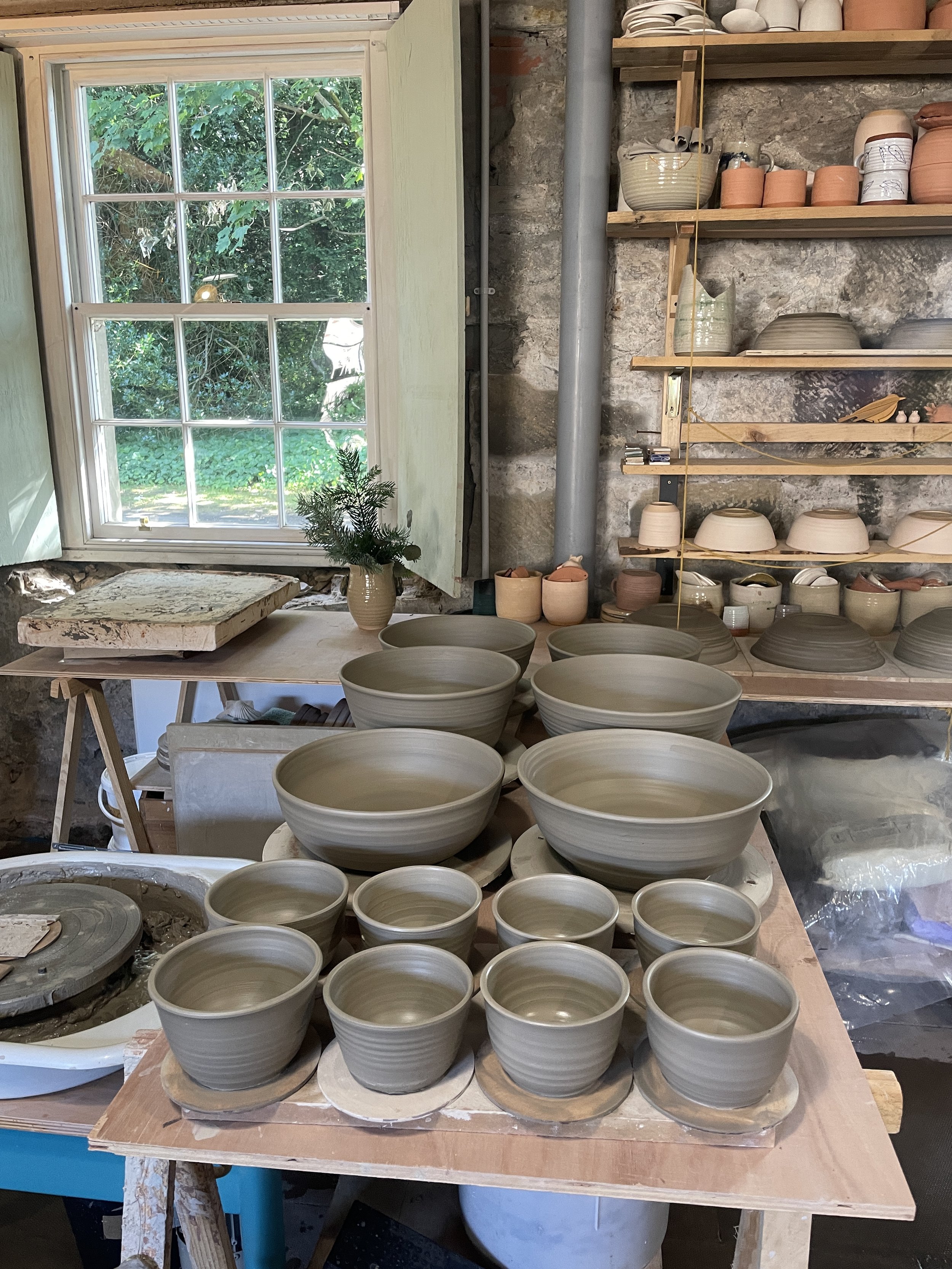 Table full of clay bowls