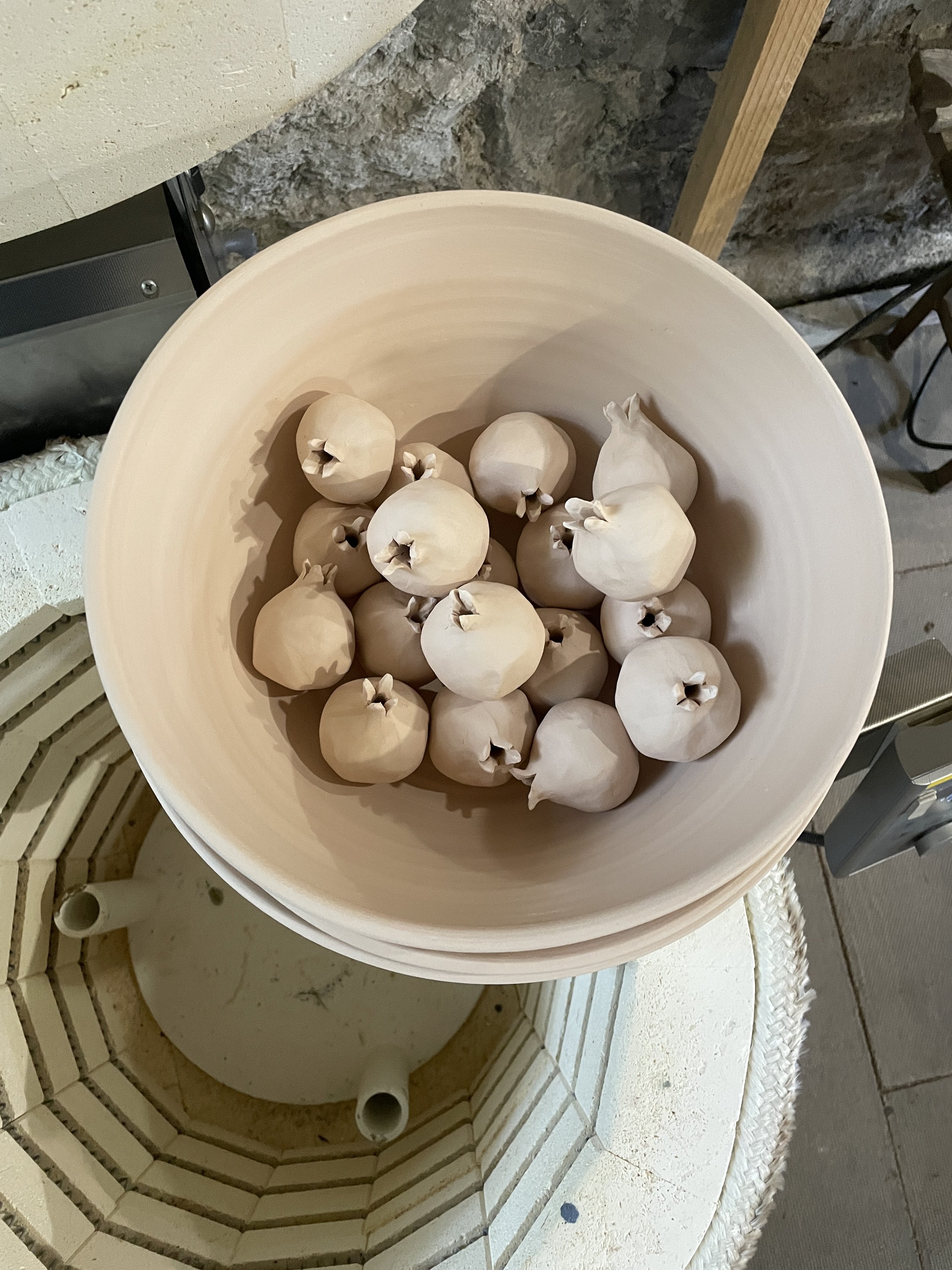 Bowl of ceramic pomegranates 