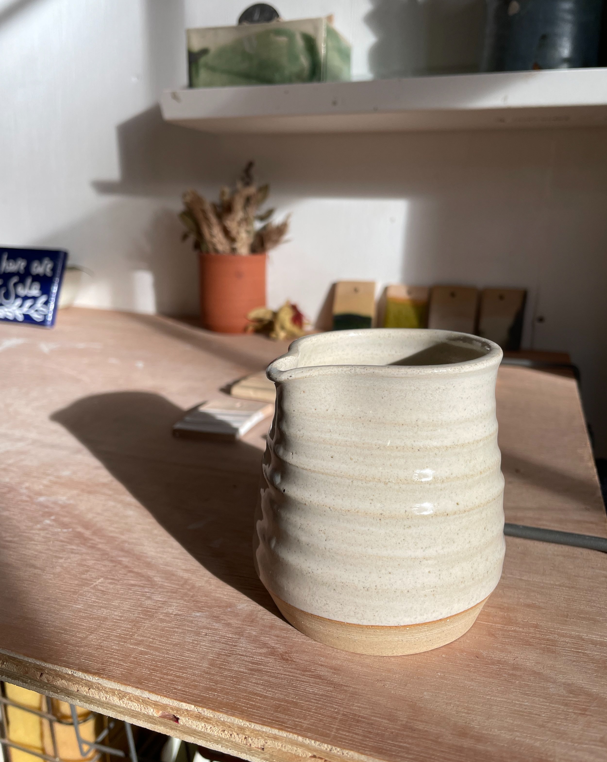 Ceramic jug in the sunlight