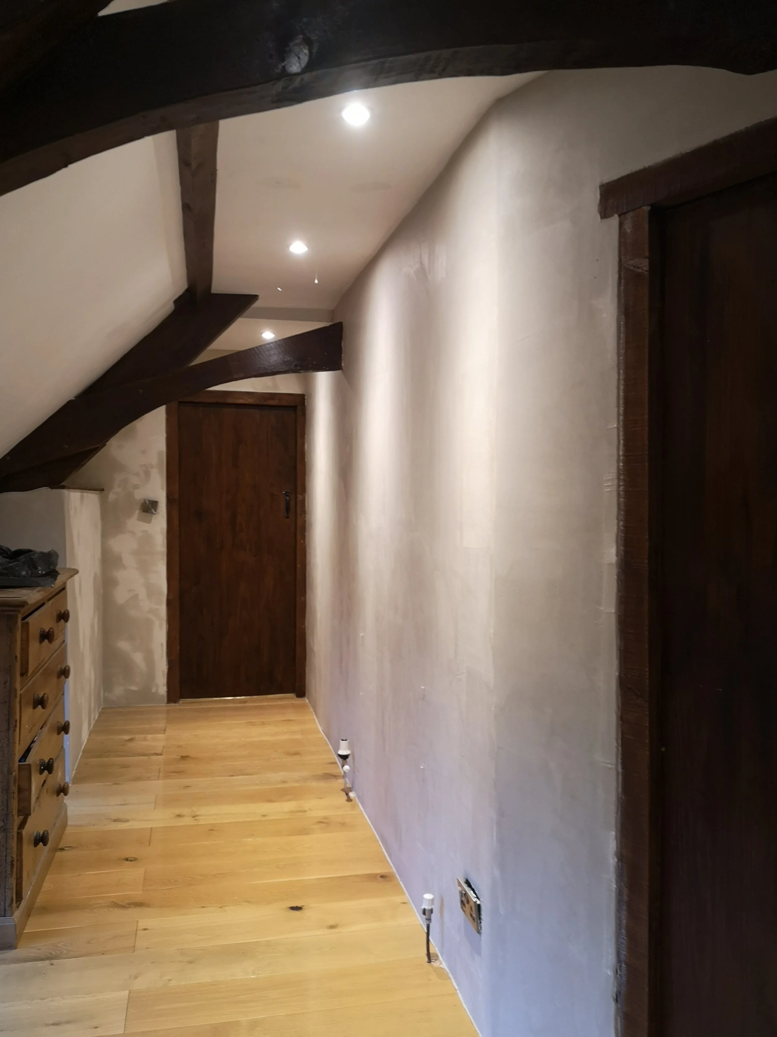 old barn conversion plastered in one coat plaster in order to modernise the property whilst keeping in character with the quirks and rounded edges