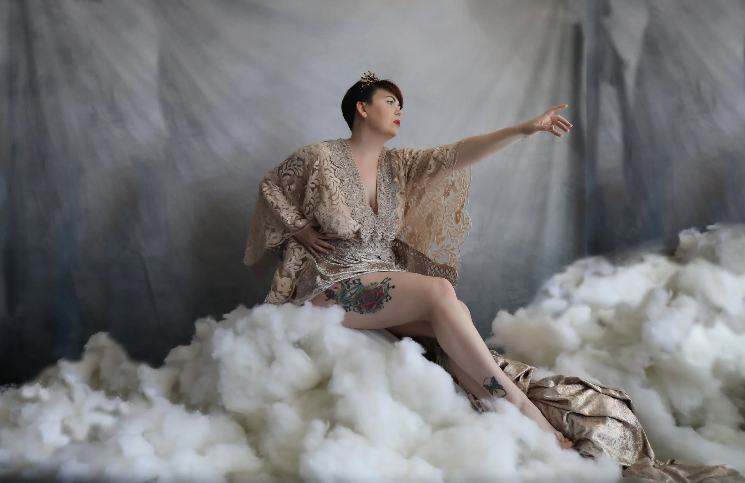 Woman sitting on clouds