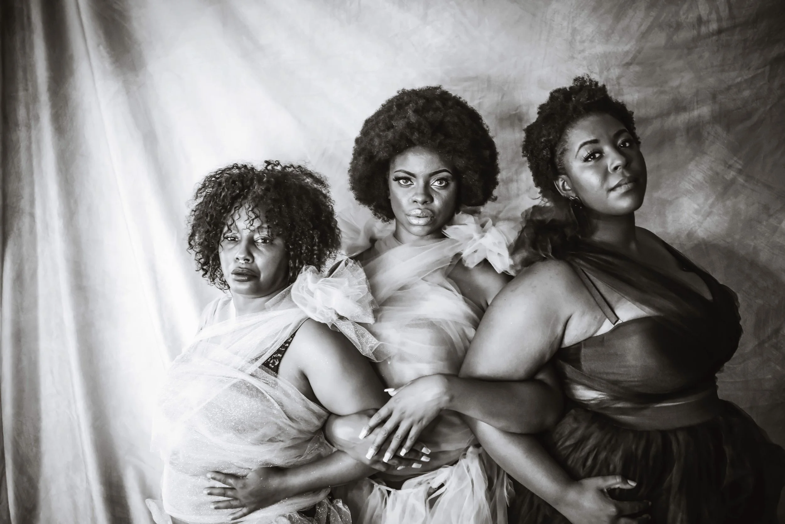 Three women standing