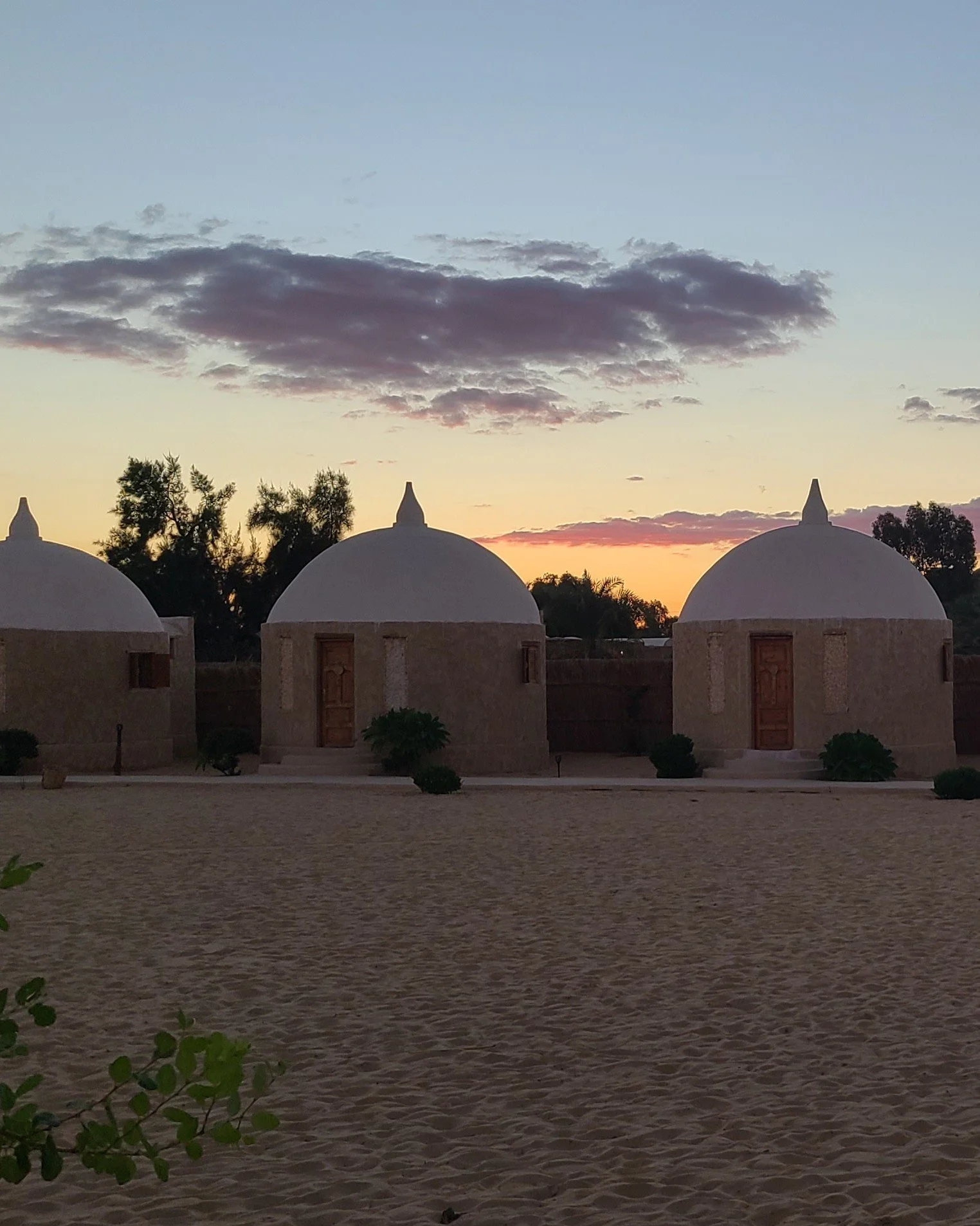 Sunset behind some of the individual cabins