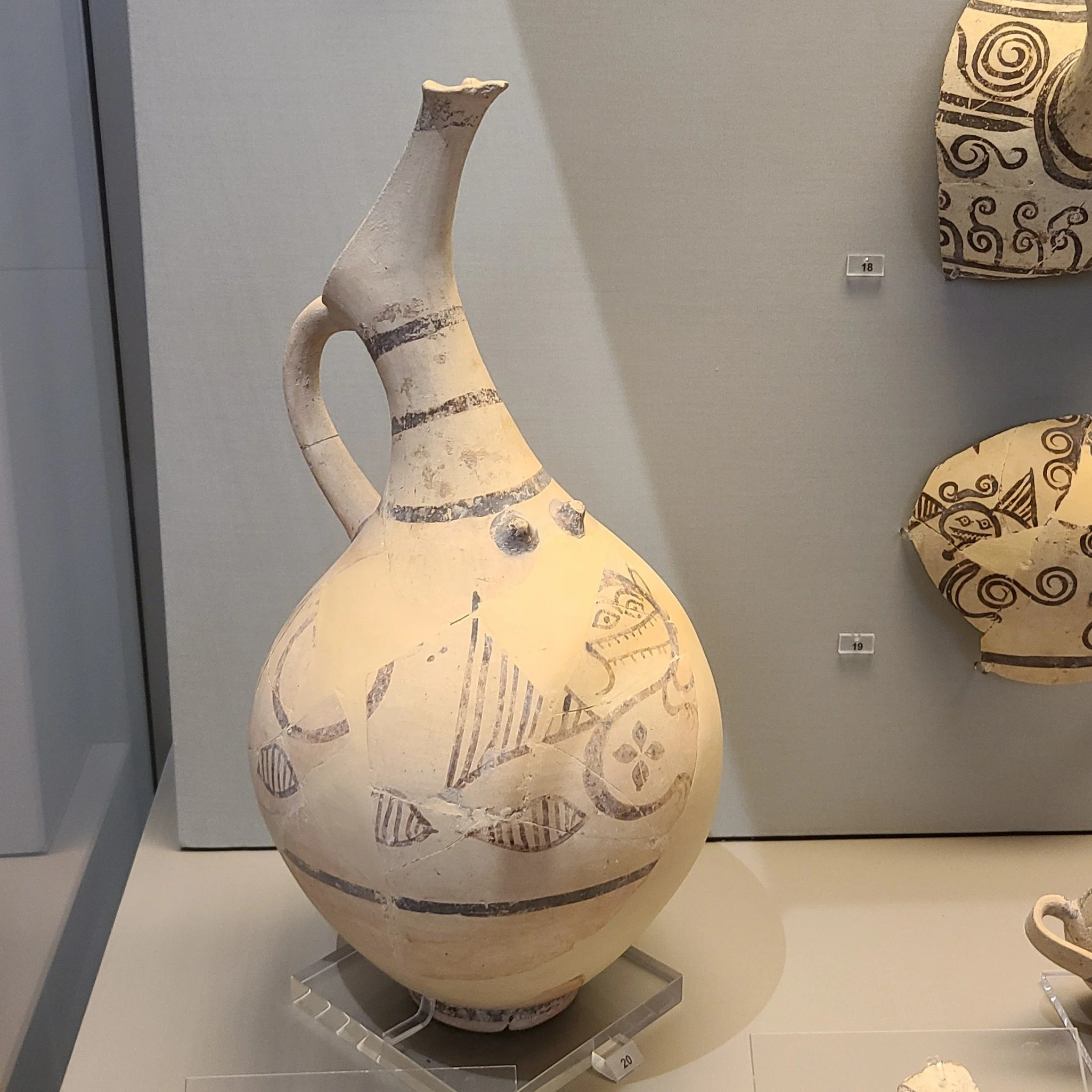 20. Beaked, nippled jug decorated with monstrous creatures. 18th-17th c BC