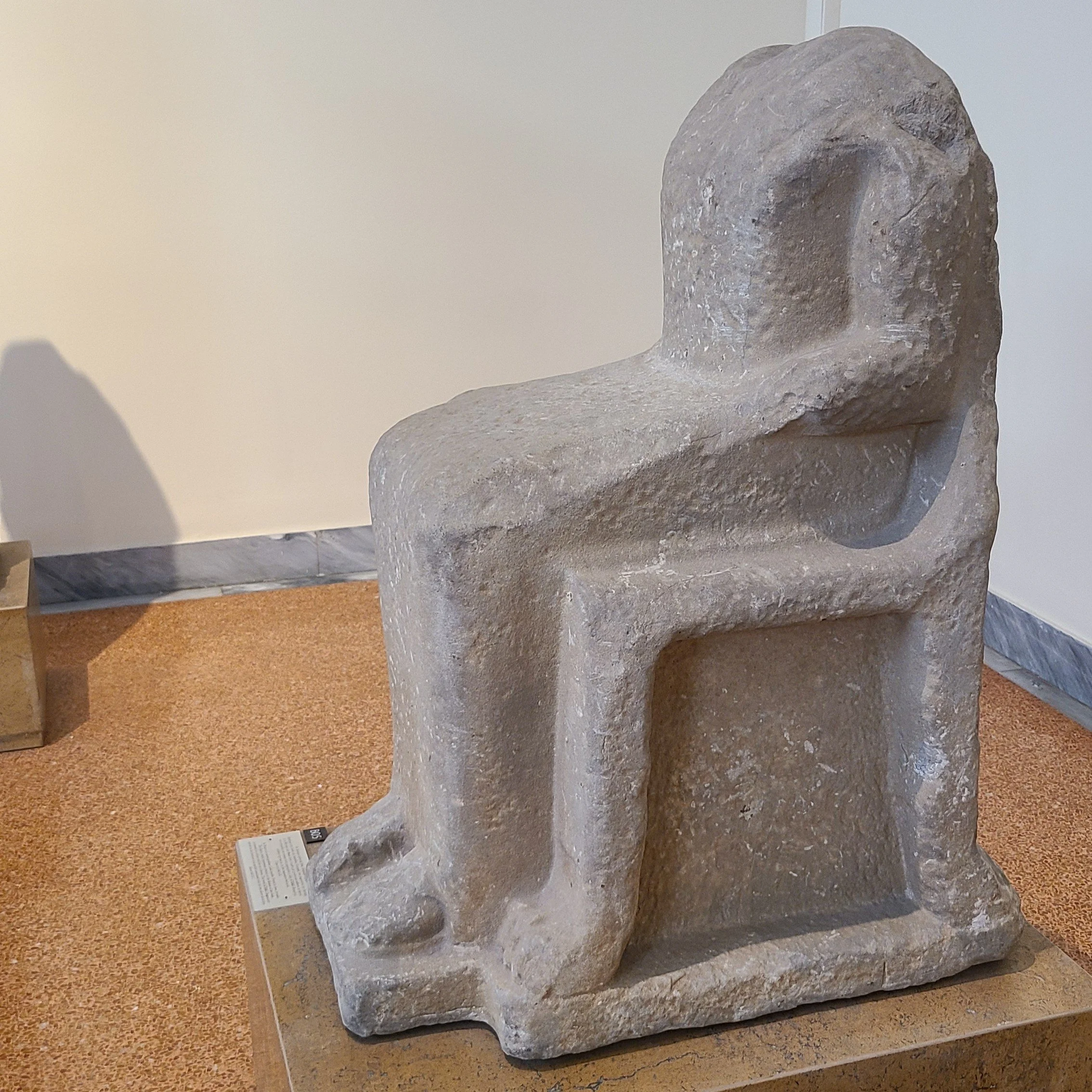 Statue of a seated goddess, Artemis, found in Asea