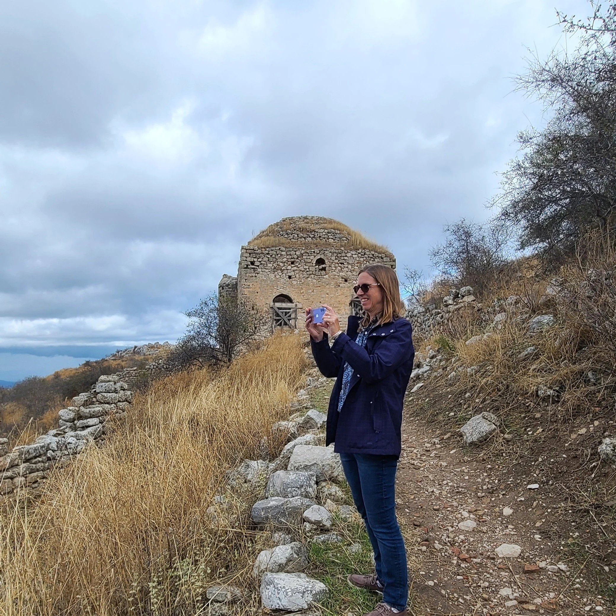 Dr. Brown with the Ahmed Pasha mosque in the background, Acrocorinth