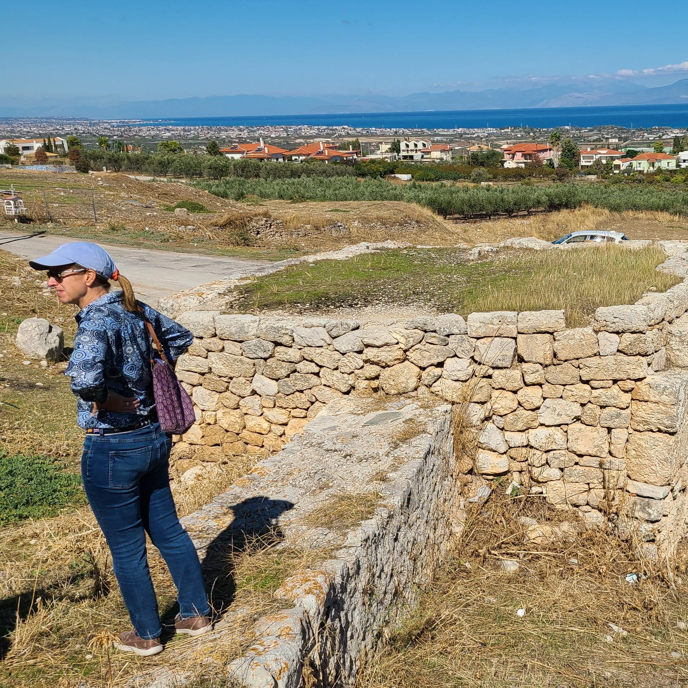 Dr. Brown behind the Hadji Moustafa Spring in Corinth