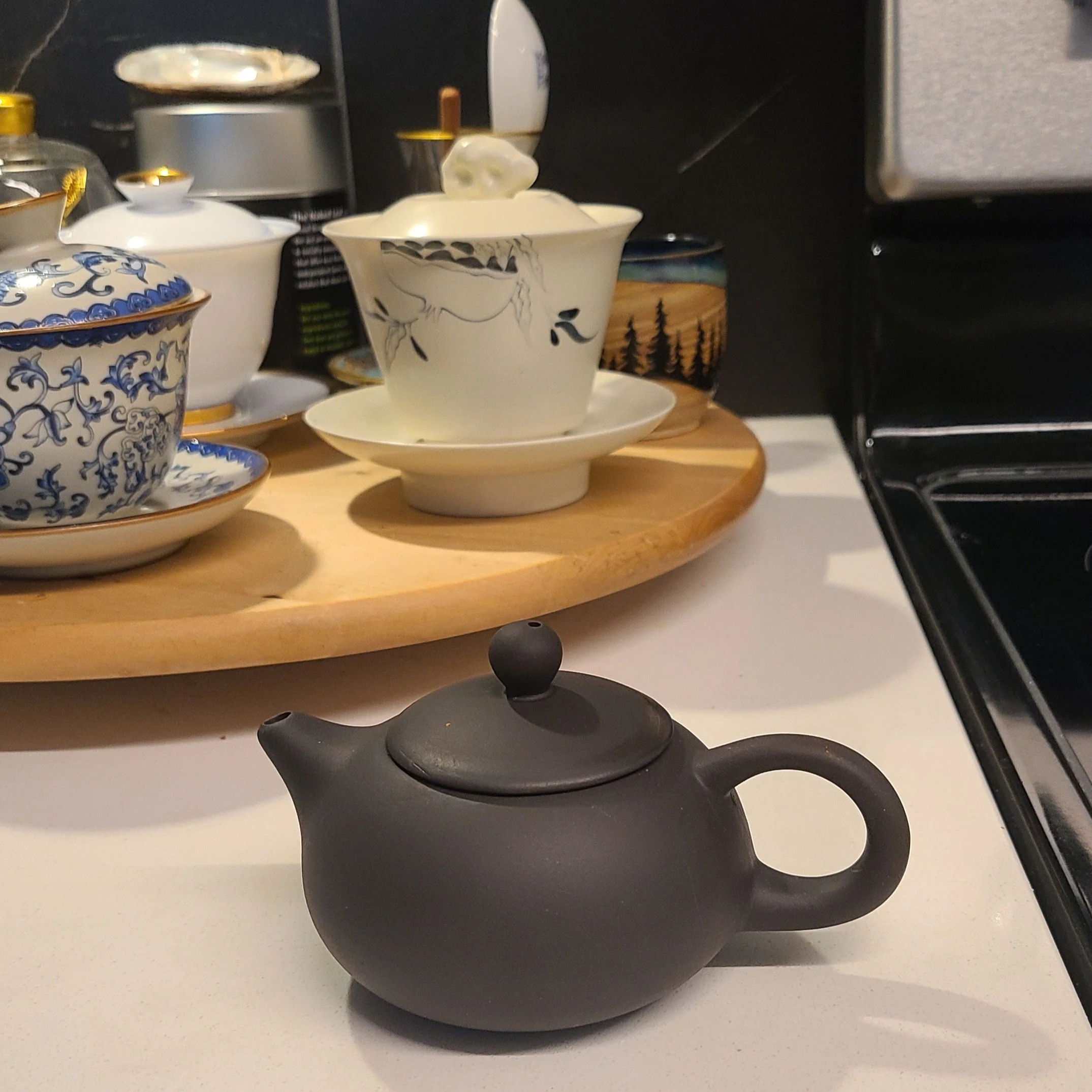 v. dark brown, rounded shape