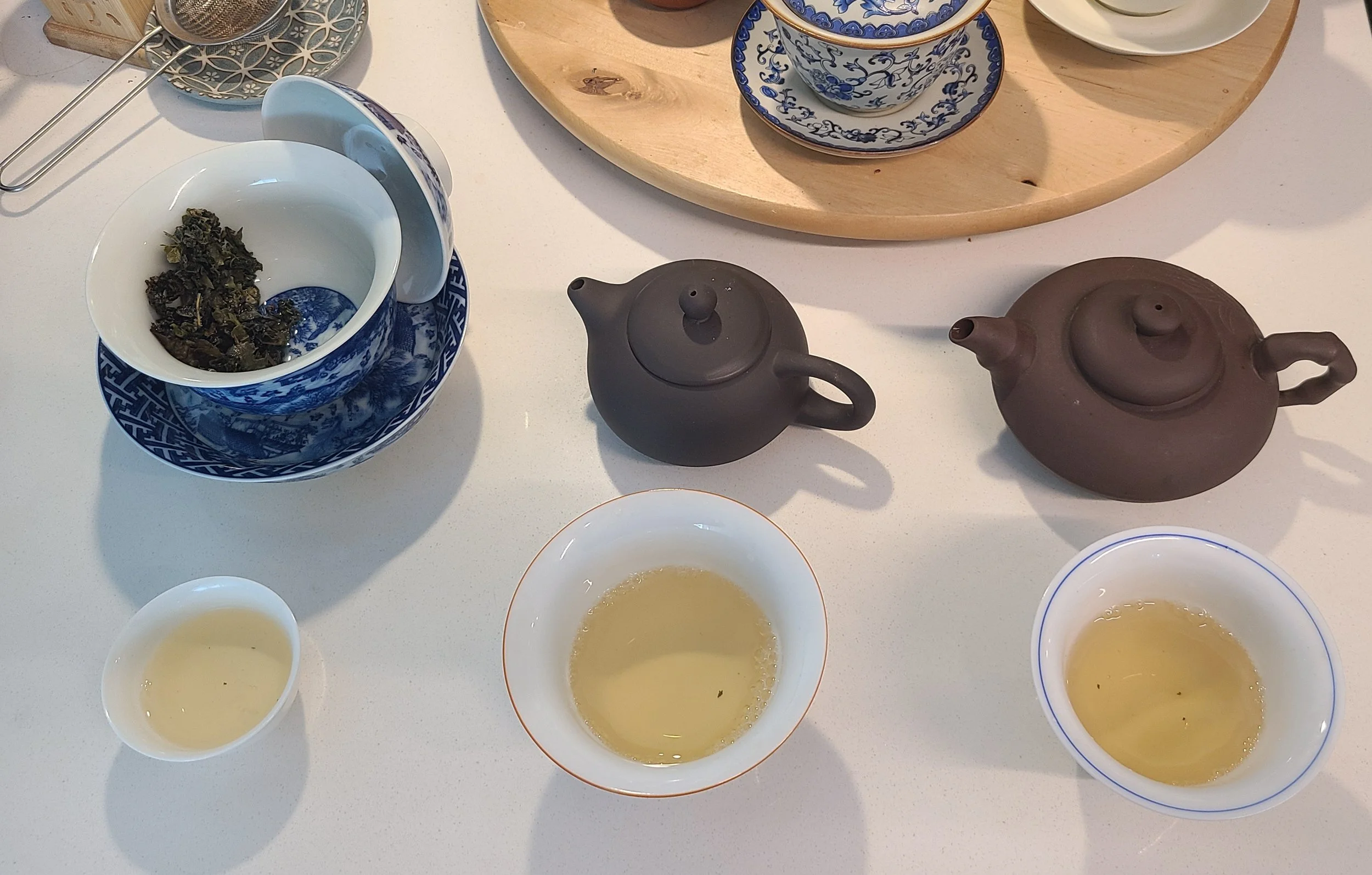 Slightly discernible colour change (less tea in the small porcelain cup on the left)