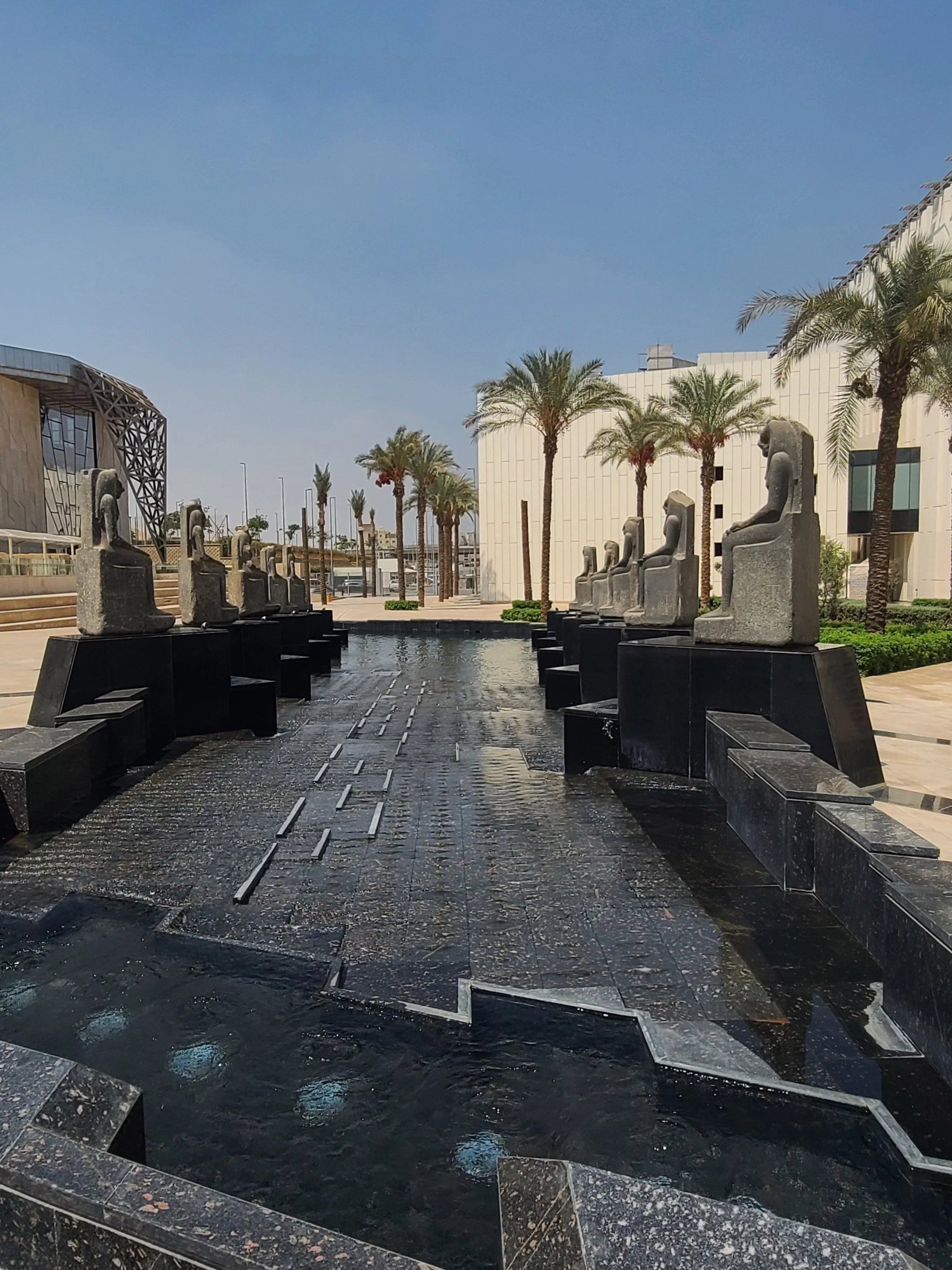 water feature w/ statues of Sekhmet