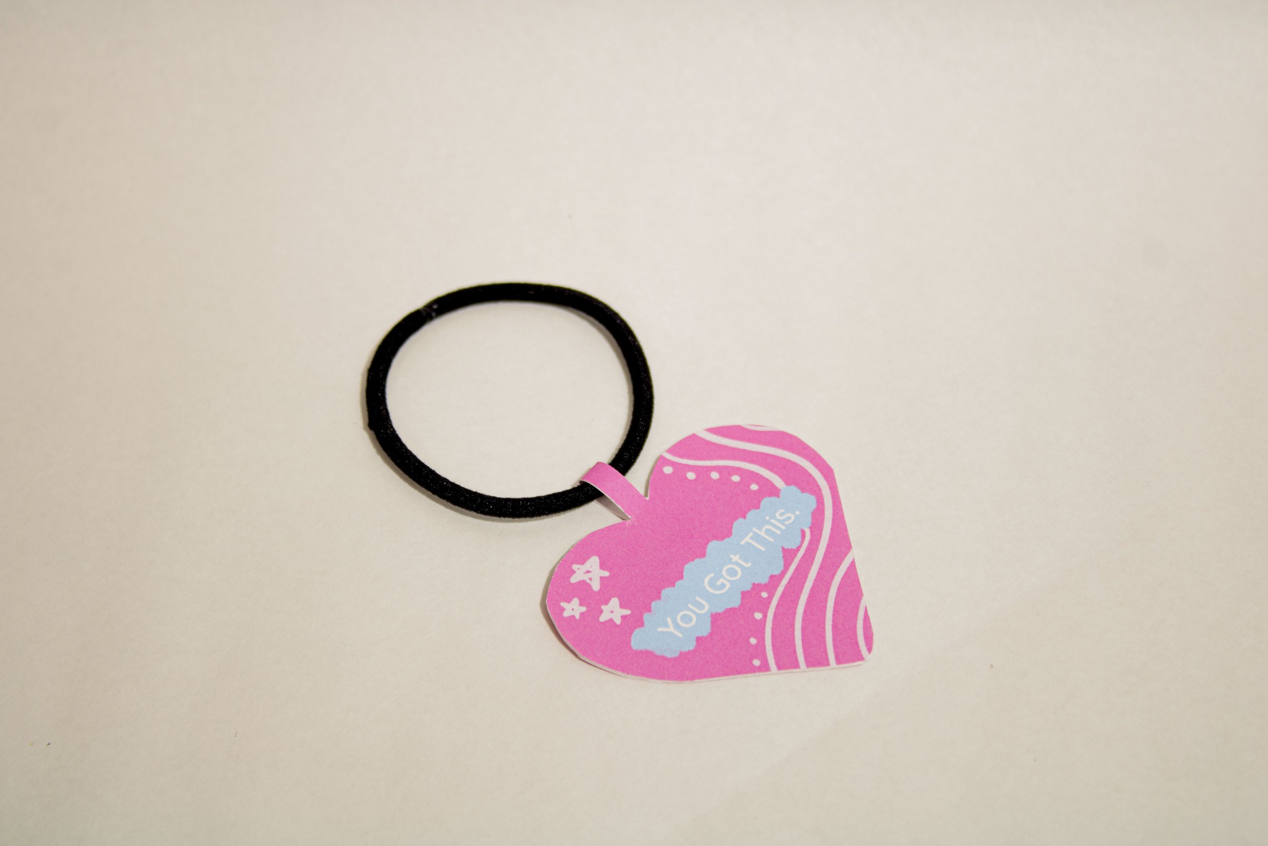 Back of tag on hair tie.