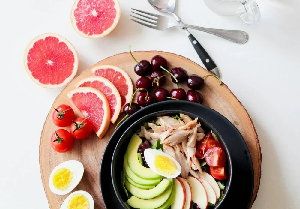 Wholefoods and lifestyle items representing nutrition and metabolic health support