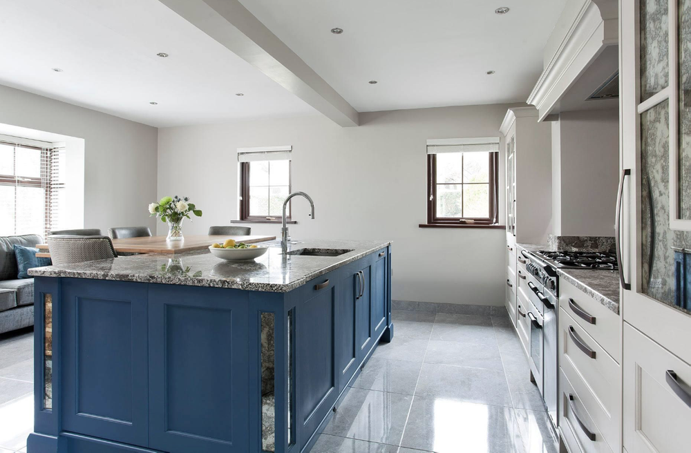 Kitchen renovation including an island, breakfast bar and lounge area