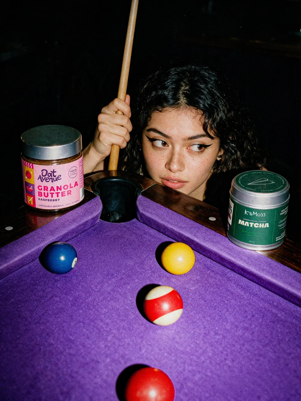KaMoss matcha campaign photography on a purple pool table, shot by CL42ITY
