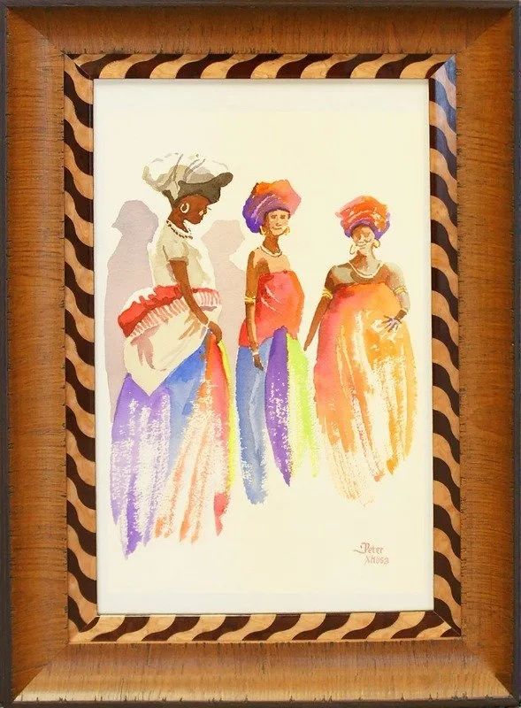 Framed artwork of three women in colorful robes, custom framed in a gold striped wood frame, San Antonio
