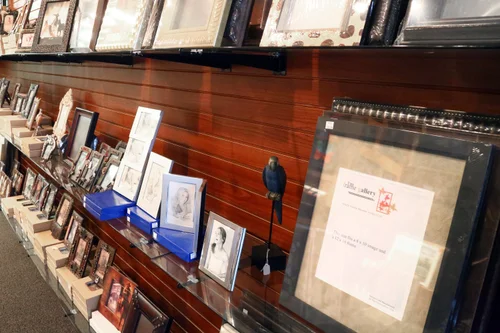 Shelves of ready-made picture frames on sale at The Frame Gallery in San Antonio