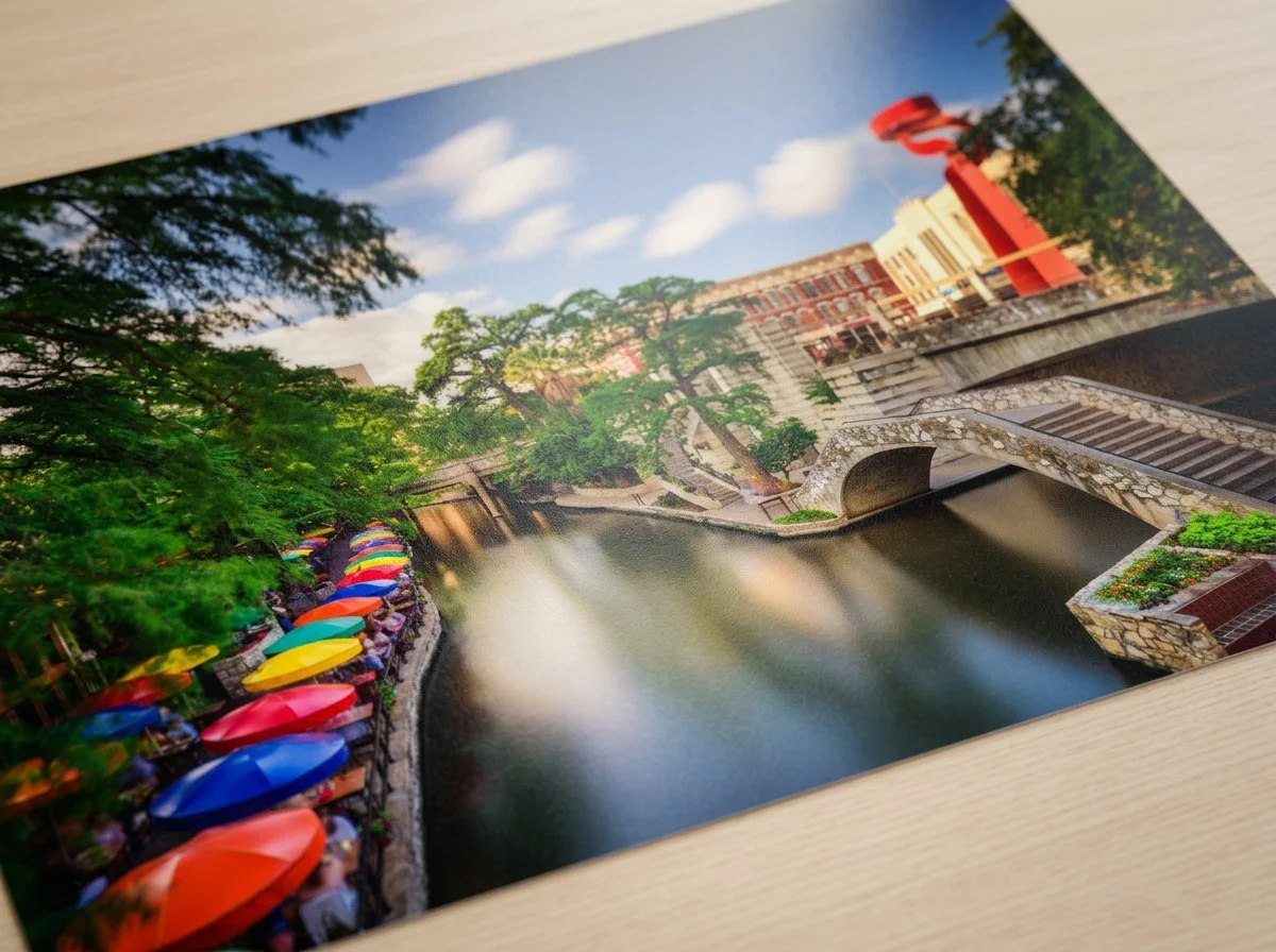 Luster photo print of the San Antonio River Walk with colorful umbrellas along the water