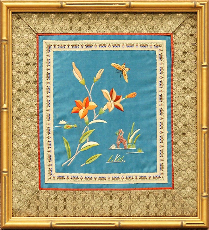 Silk embroidery of orange lilies on a turquoise ground, custom framed in an ornate gold frame, San Antonio