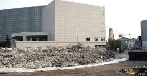 The long-abandoned Polaris Building in downtown Fairbanks is now rubble. Among many other things it was the place where Johnny Warren met Diane Wells a few times; Johnny's friend Kenny lived here, and loaned him the keys to his apartment.