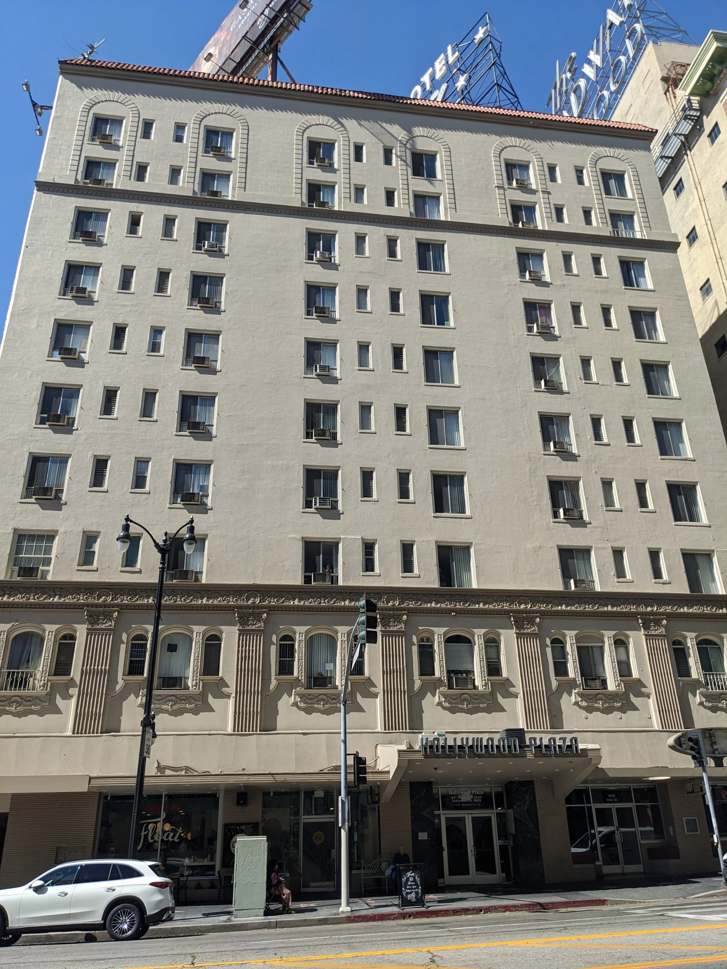 The Hollywood Plaza Hotel today - March 9, 2026. Their rooftop sign "hotel" can just be seen; it's obscured by an advertising billboard now.  