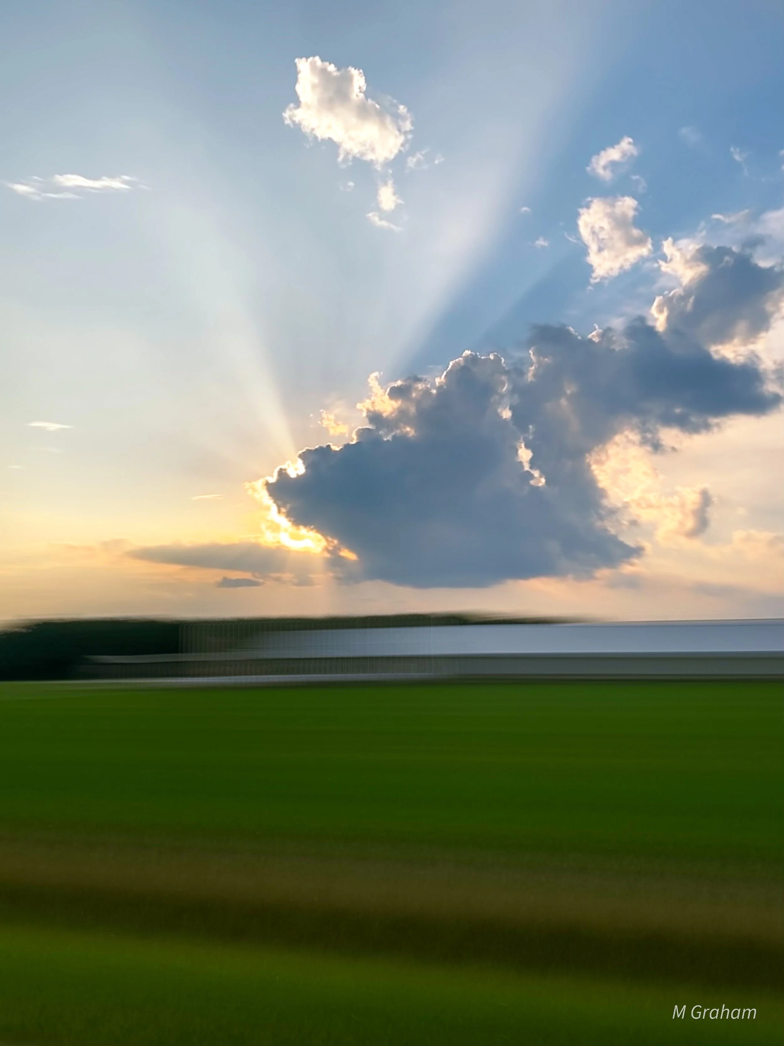 SunbehindCloudsICM.jpg
