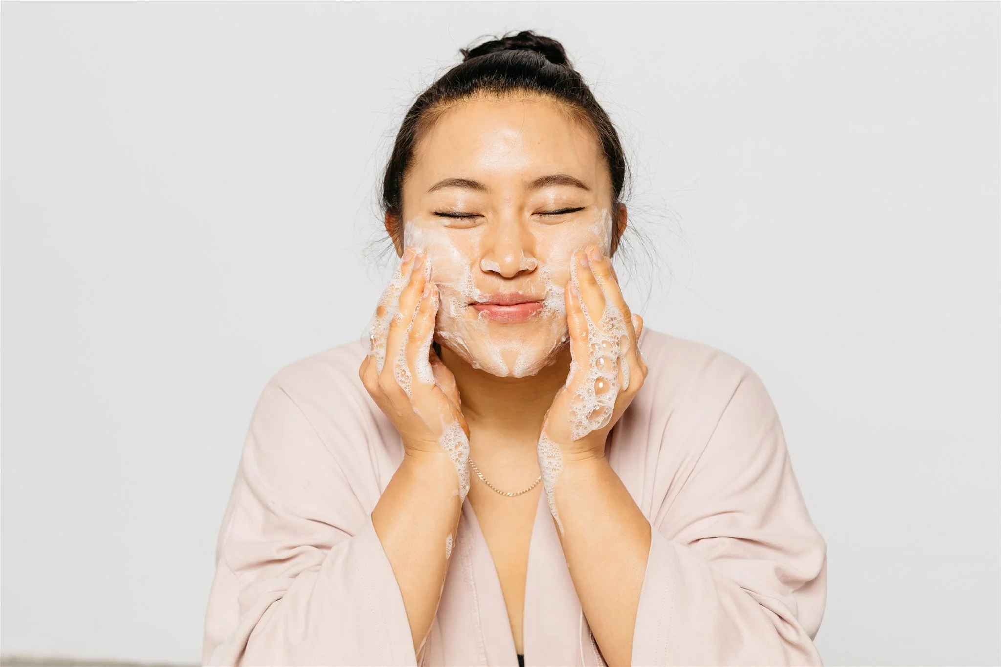 Soaps_Model washing face with complexion bar suds 2.jpg