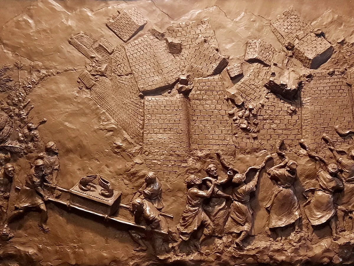 bronze relief sculpture of the battle of jericho