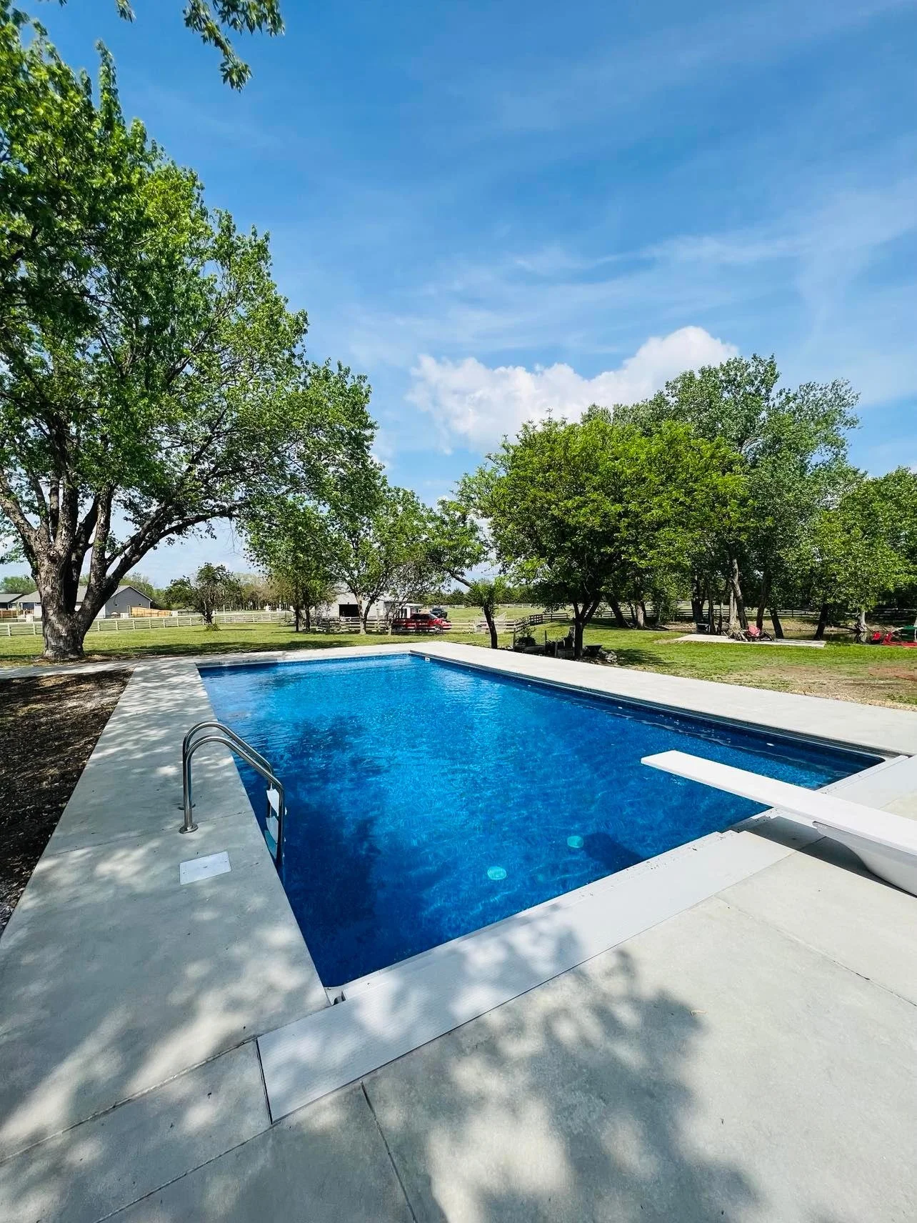 Beautiful pool with trees near by build by Super Pools