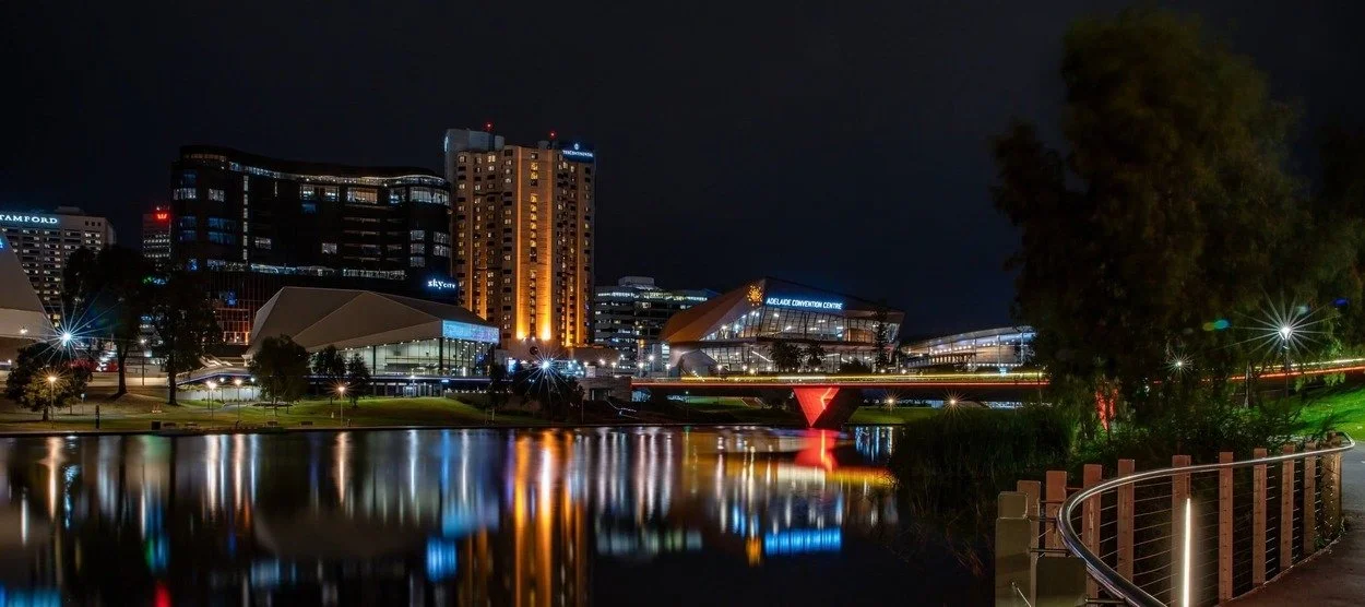 Contact the Tech1solutions he in Adelade South Australia - River Front of Adelaide at night