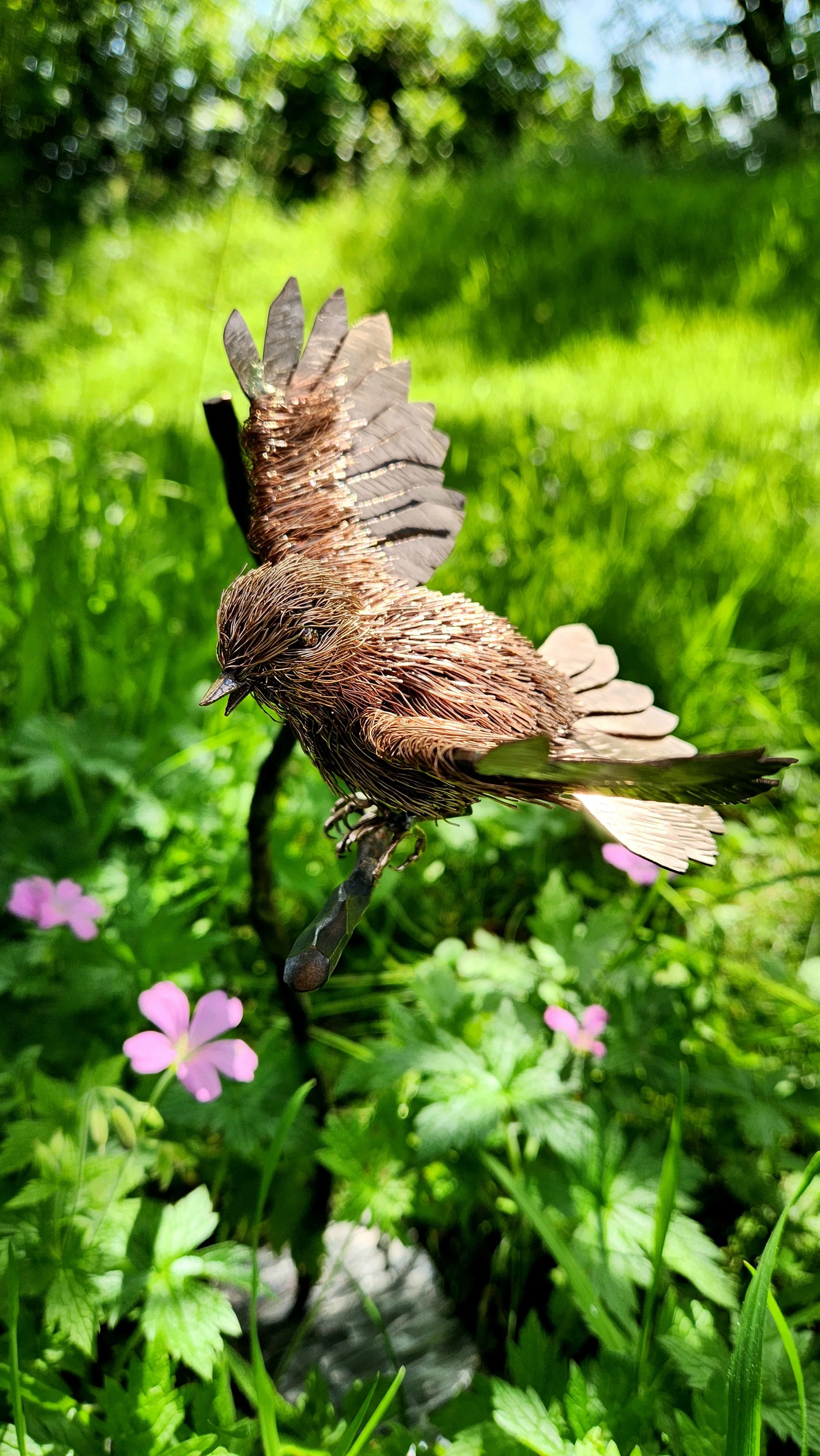 handmade copper bird sculpture