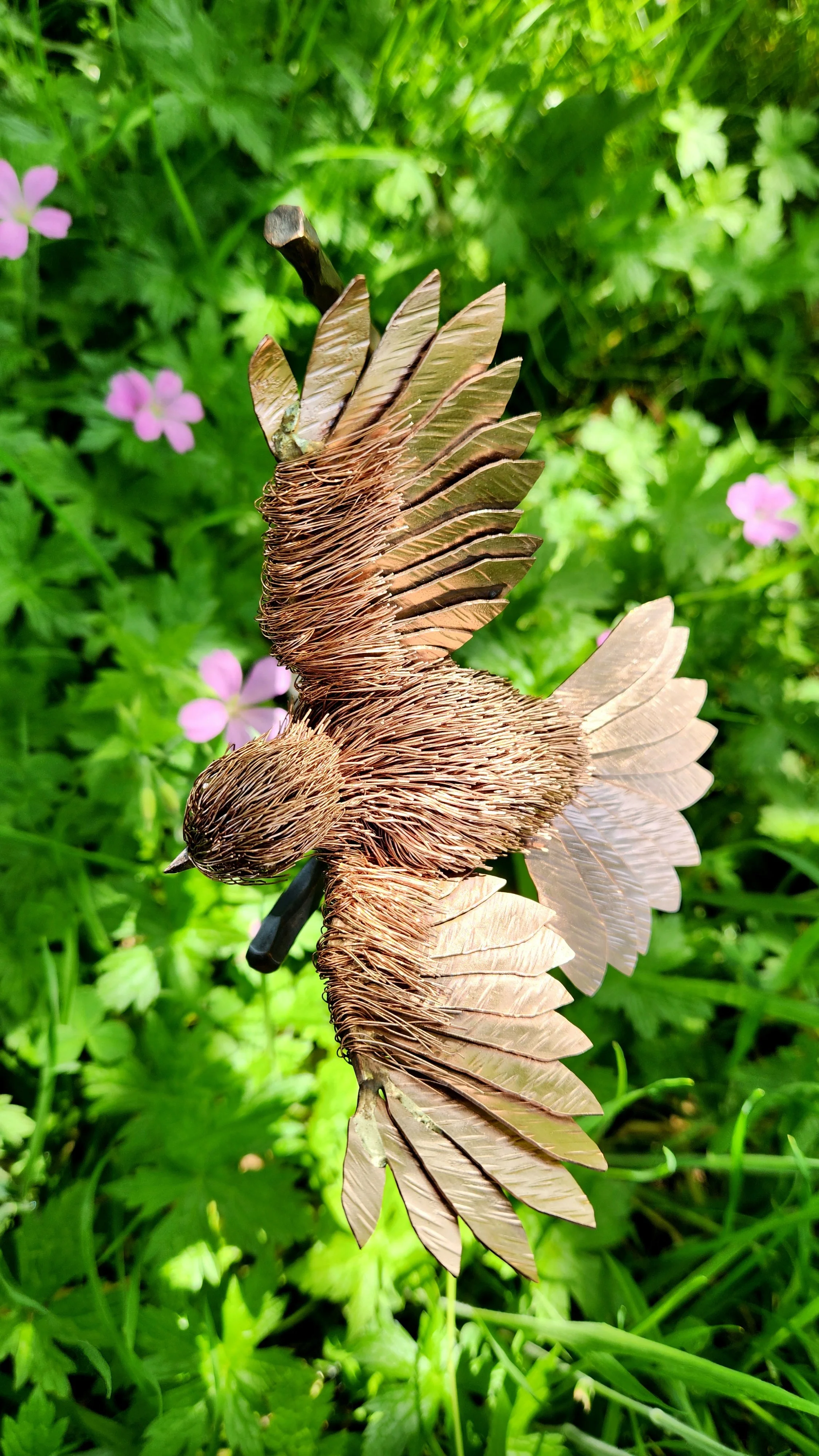 handmade copper bird sculpture