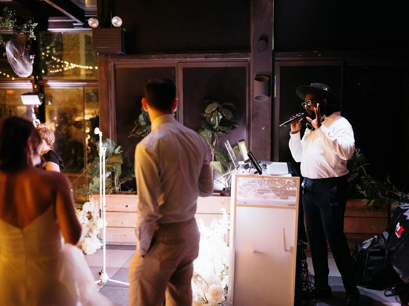 “NYC Wedding DJ & MC DJ Jon Blak hosting and performing at an elegant wedding reception, providing professional DJ and MC services for weddings, corporate events, and sports events in New York City.”