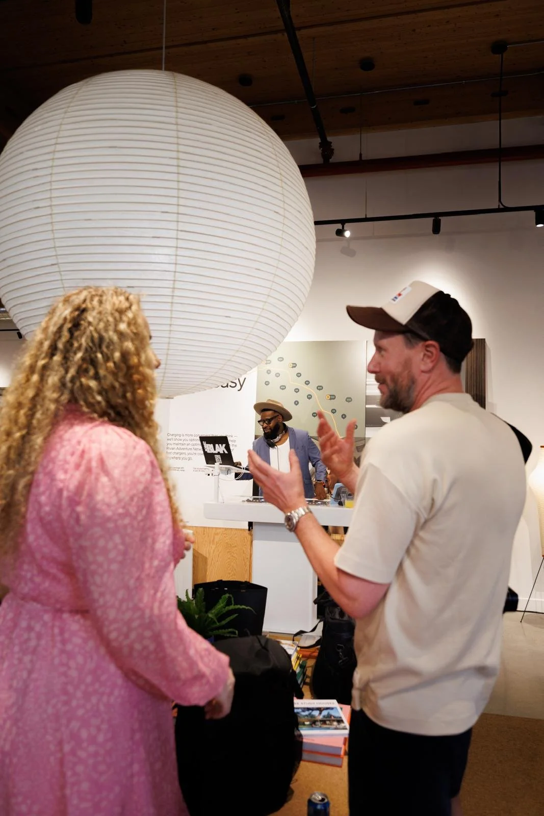 “NYC Wedding DJ & MC DJ Jon Blak performing at a modern corporate event, creating a lively atmosphere with professional DJ services for weddings, corporate events, and sports events in New York City.”