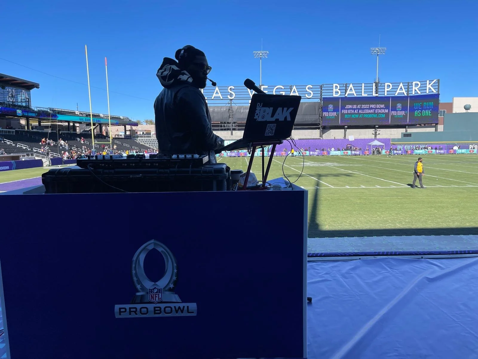 “Sports DJ DJ Jon Blak performing live at a professional NFL Pro Bowl event, delivering high-energy professional DJ services.”
