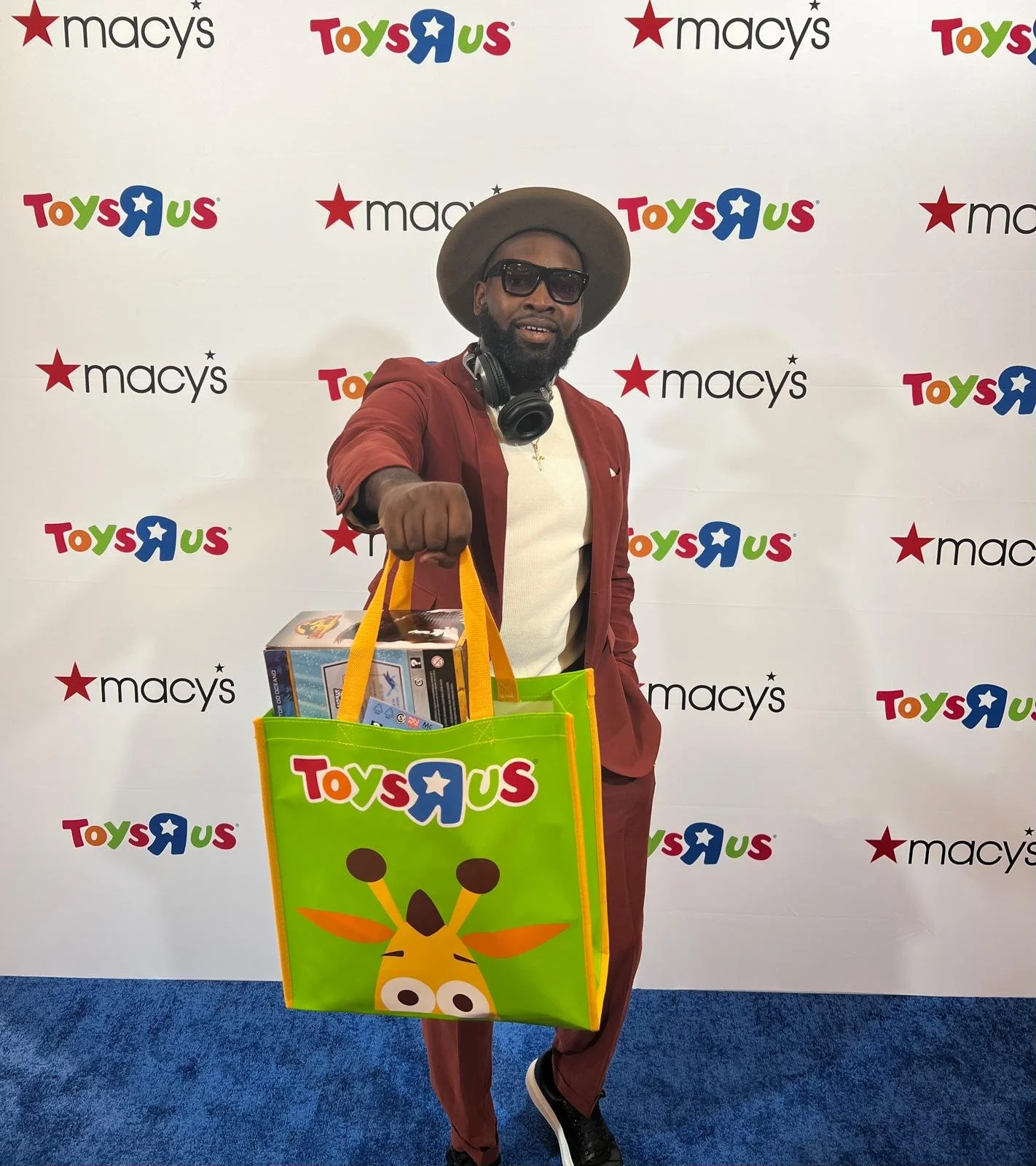 “NYC Wedding DJ & MC DJ Jon Blak attending a branded corporate event, showcasing professional DJ services for weddings, corporate events, and sports events in New York City.”