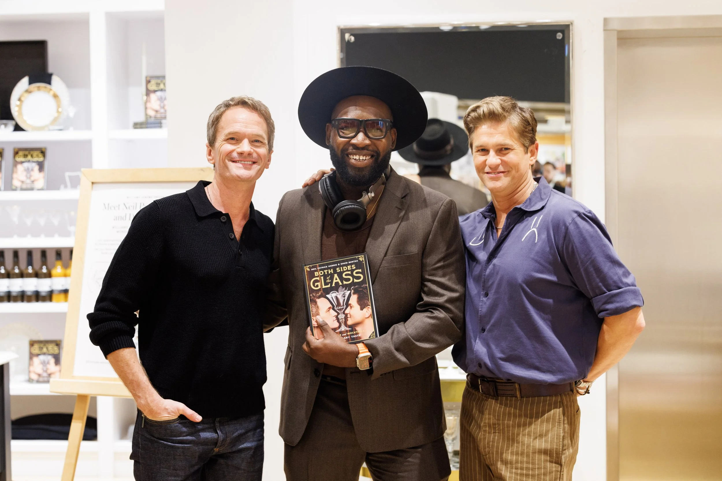 “NYC corporate event DJ posing with event guests at a brand activation, showcasing professional DJ services for corporate events, private parties, and luxury experiences in New York City.”
