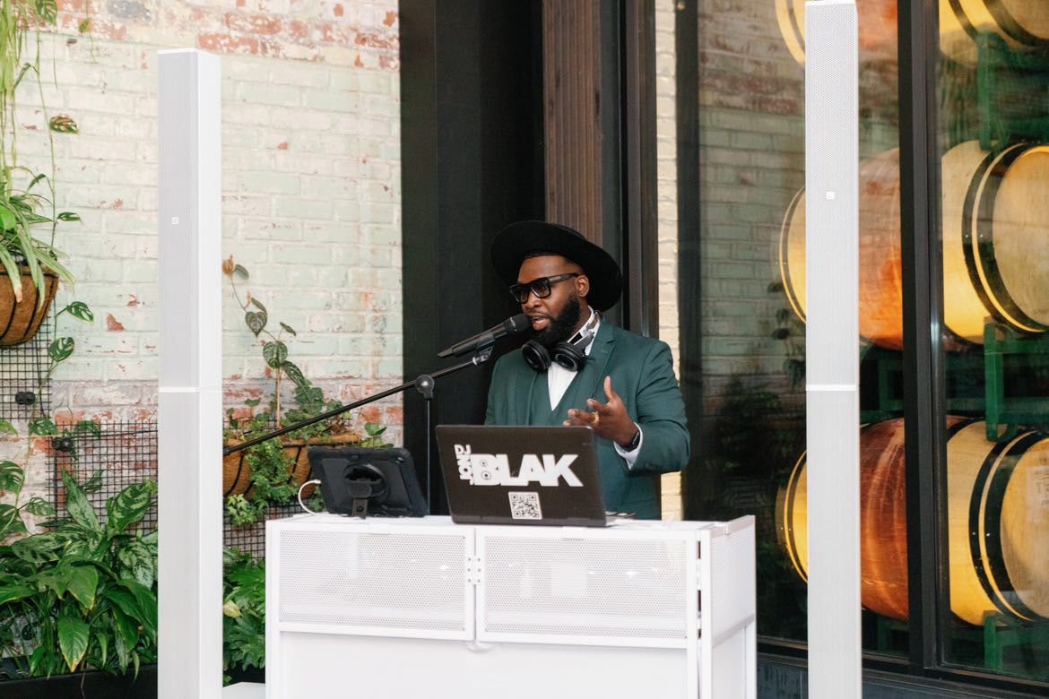 “NYC Wedding DJ & MC Jon Blak performing live at an elegant event, professional DJ services in New York City.”
