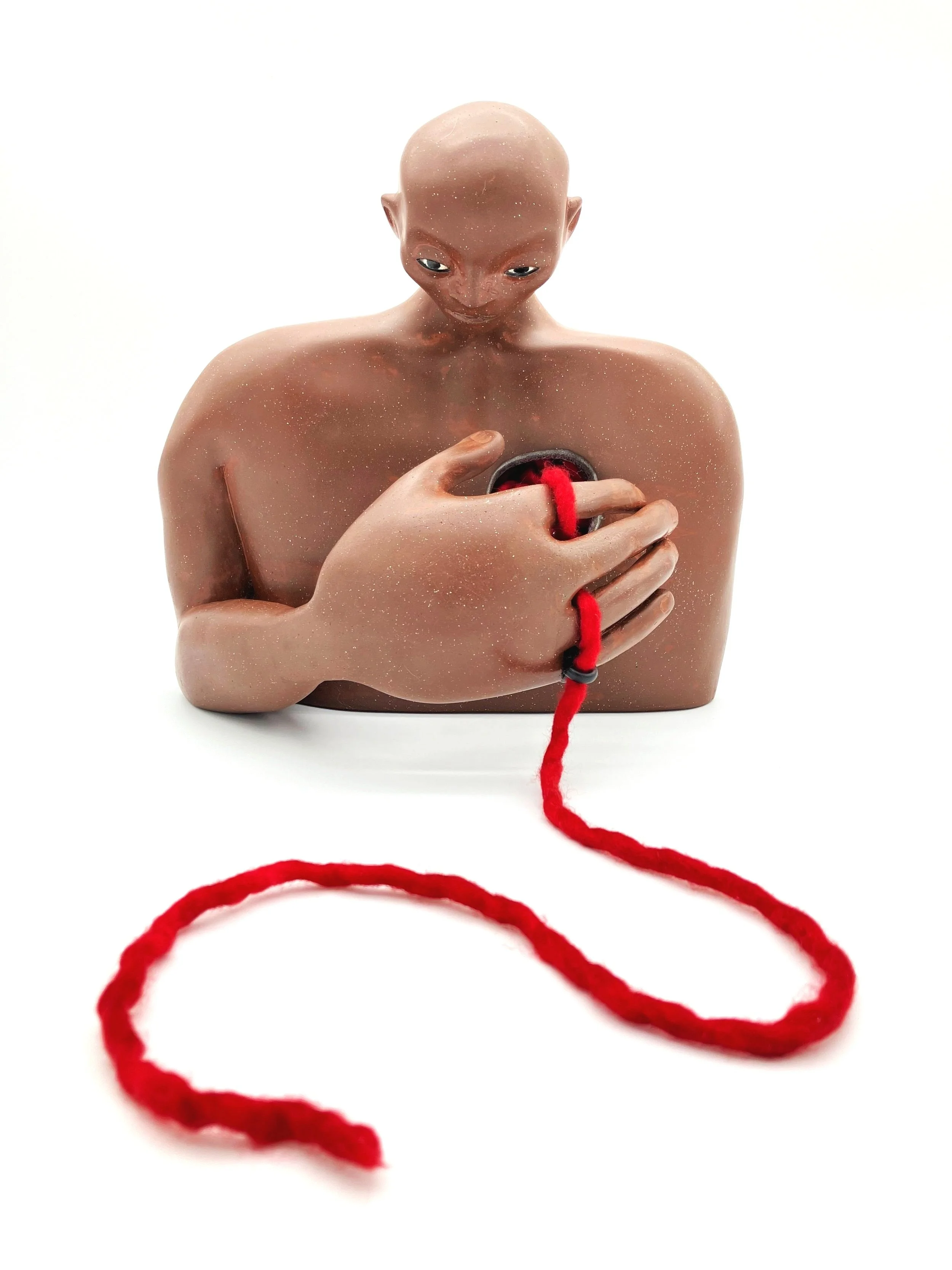 ceramic clay and wool roving ,figurative bust