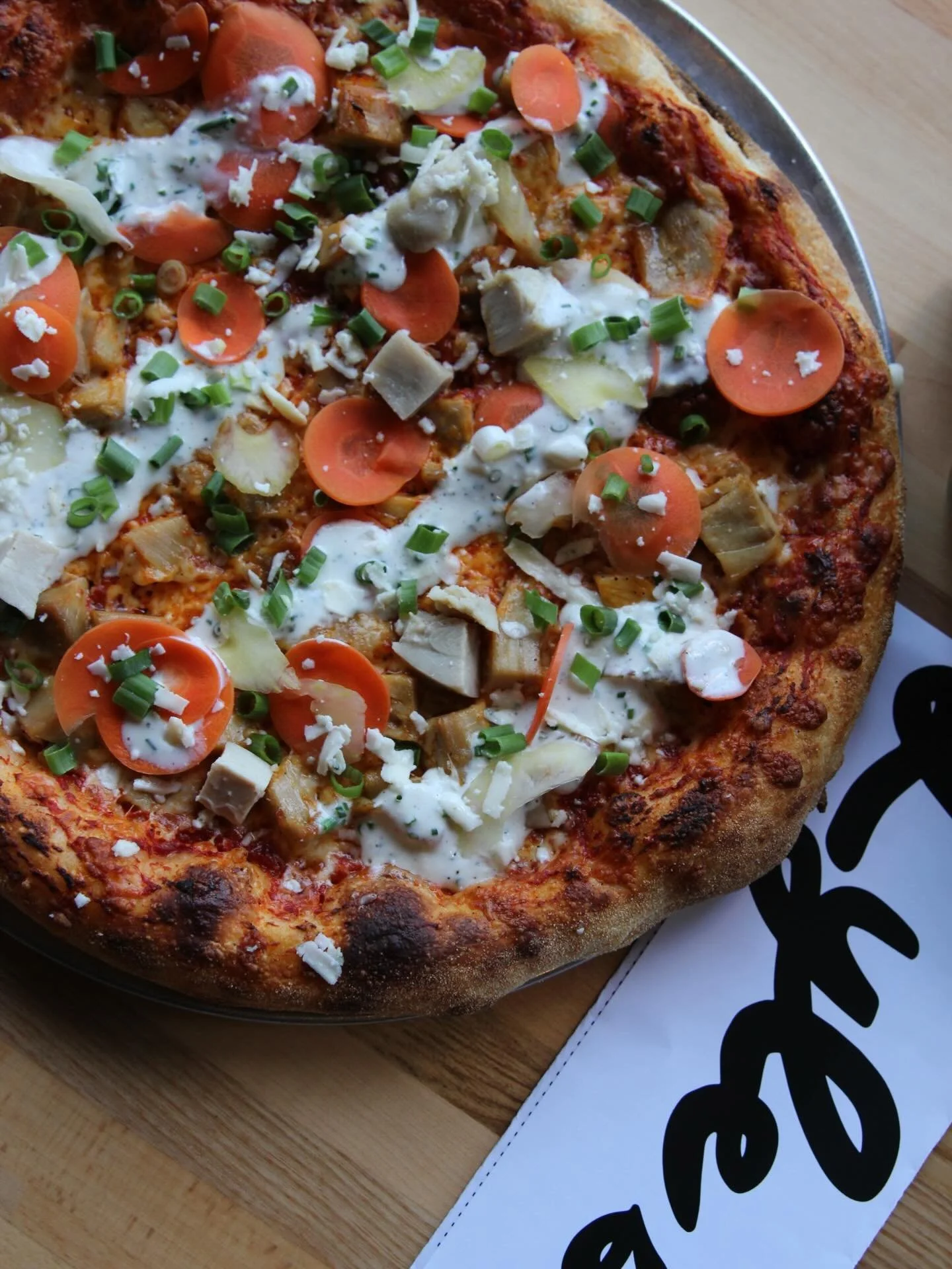 The Moody Blues special 🍕

* Buffalo tomato sauce
* Mozzarella
* Chicken
* Blue cheese dressing
* Pickled carrot &amp; celery
* Scallions

All weekend specials are dine in only