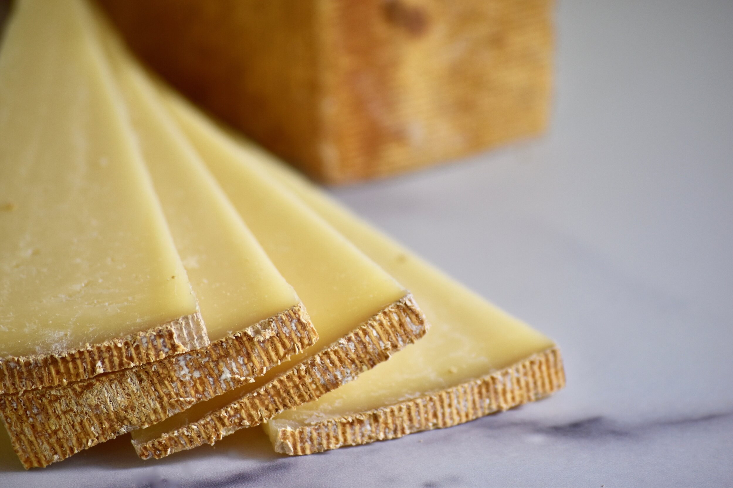 Rind close-up of cut Alpha Tolman pieces 