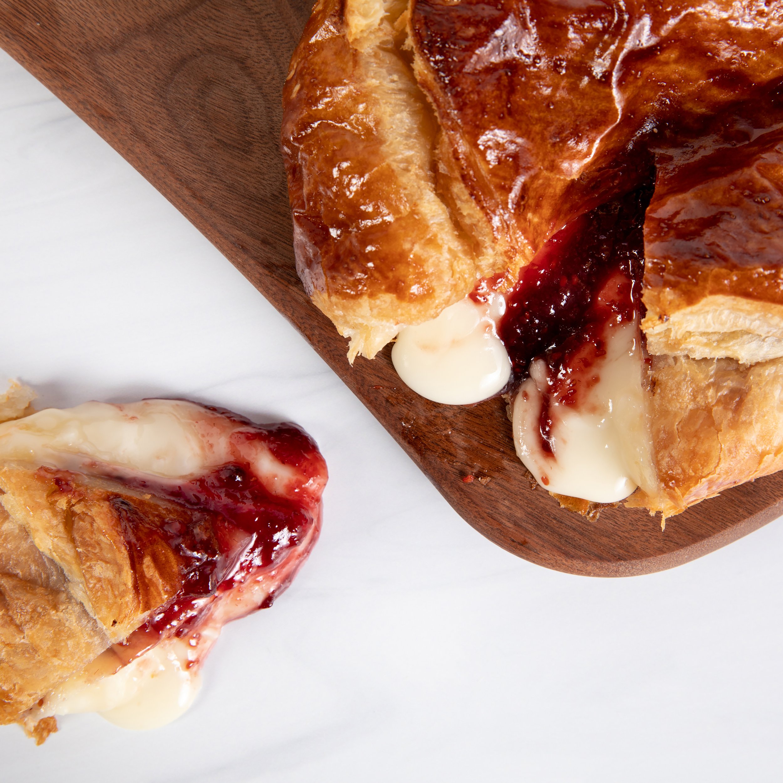  Close-up of Haribson baked into a pastry with raspberry jam  