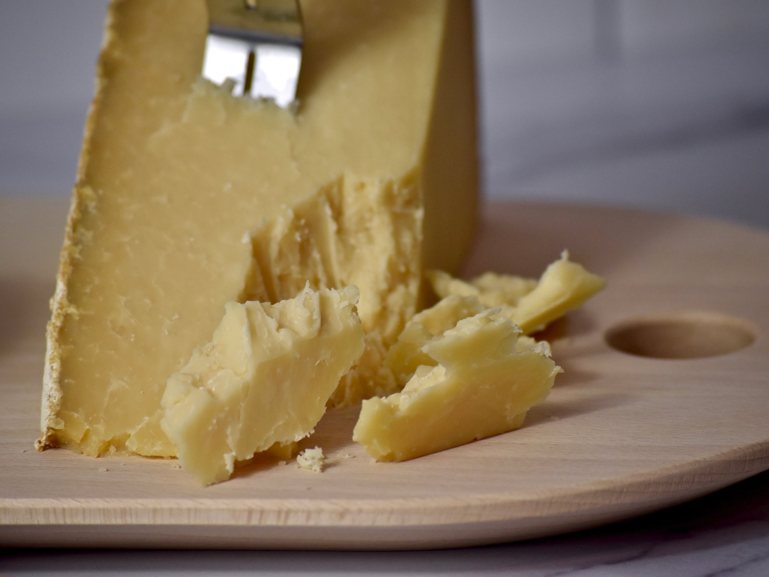 Close-up of crumbles of Cabot Clothbound Cheddar cheese