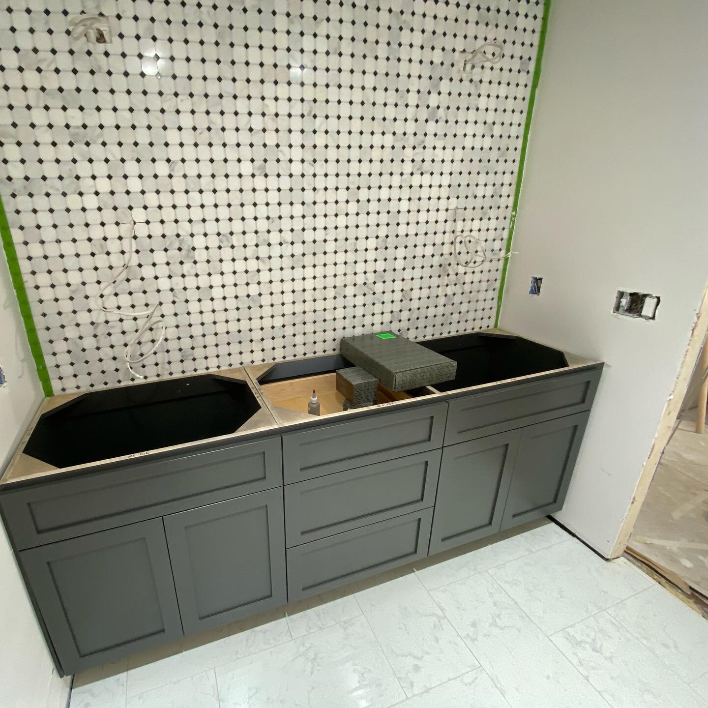 A beautiful vanity cabinet by @swincraftcabinets This vanity and shower bench seat will get a beautiful quartz top, and the vanity will receive a tower extending to the ceiling.