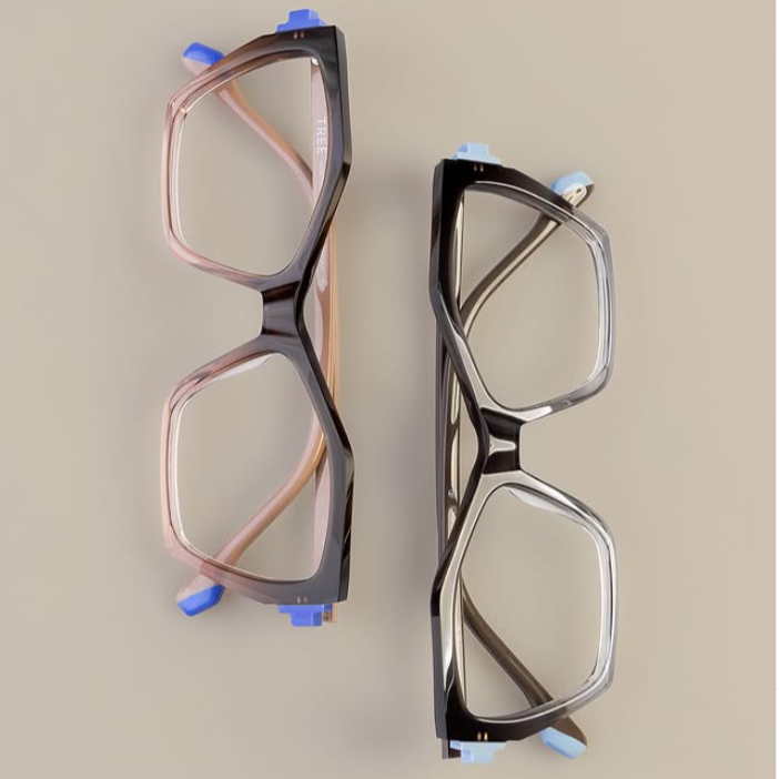 Two spectacle frames in pink/brown and blue and grey fade with baby blue tones